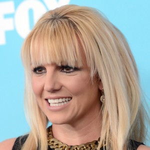 Britney Spears covers her sunken internet-addicted eyes with cakey makeup.