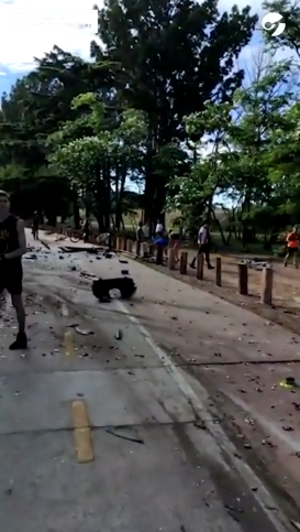 Still from cellphone video shows path of destruction where Troubadour drove onto a bike lane, striking at least five cyclists.