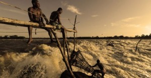 Elderly, but youthful, the Enyan tribesmen fish at Wagenia Falls.