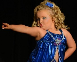 The late Honey Boo Boo poses for judges on the reality TV show Toddlers and Tiaras.